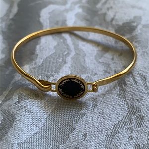Marc Jacobs gold plated bangle enameled logo disc